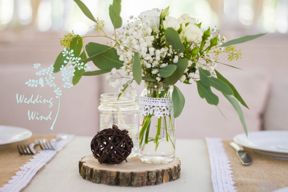 Цветы в декоре свадьбы в стиле рустик
